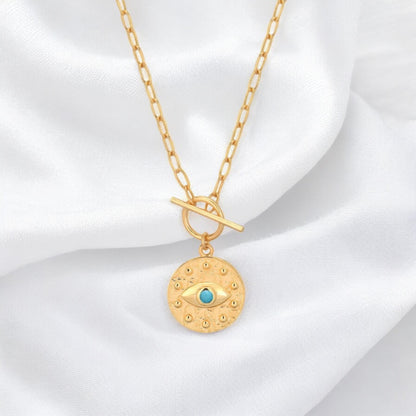 luxury evil eye pendant necklace crafted in gold plated sterling silver with gemstone details Gem Karageorgiou jewellery